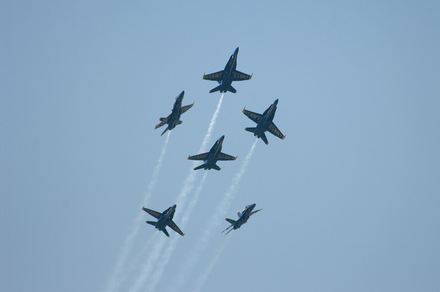 BARKSDALE AIR FORCE BASE, La. -- The U.S. Navy Blue Angles perform fast-paced, high-performance maneuvers during the 2008 Defenders of Liberty Airshow here May 9. The team performs precision aerial maneuvers to exhibit the capabilities of modern high-performance aircraft to audiences around the world. Last season, more than 15 million spectators watched the Blue Angels perform. Since its inception in 1946, the Blue Angels have performed for more than 427 million fans.  (U.S. Air Force photo/Tech. Sgt. Robert J Horstman)