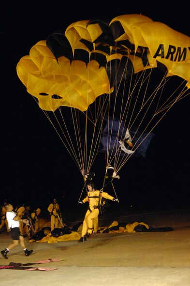 BARKSDALE AIR FORCE BASE, La. - A member of the U.S. Army Golden Knights lands on target during the twilight portion of the Defender's of Liberty Air Show here on May 9. (U.S. Air Force photo by Airman 1st Class Joanna M. Kresge)