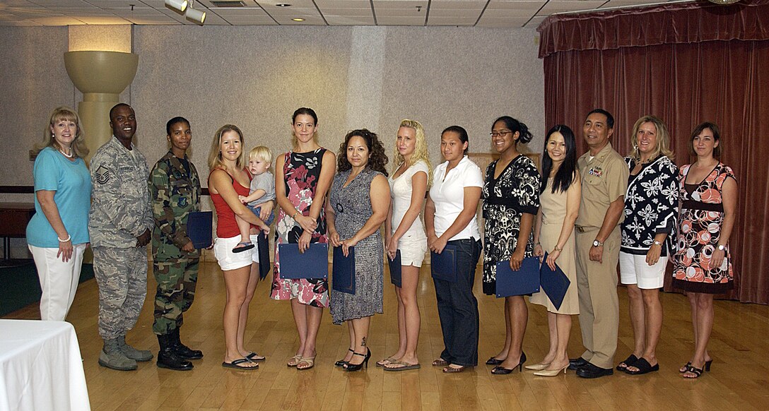 The Andersen Officers' Spouses' Club awarded $20,500 in scholarships this year. The AOSC received a record number of scholarship applicants this year making the selection process highly competitive. The scholarships were awarded to Hannah Ainbinder, Kathleen Josef, Fenton Fitzgerald, Jade Vitug, Emilie Fidler, Celeste Gonzalez, Jacqueline Schniers, Brooke Thompson and Lane Price. (U.S. Air Force photo by Airman 1st Class Carissa Wolff)