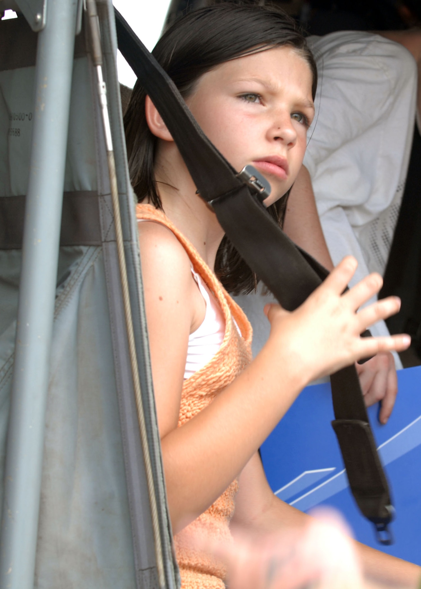 BARKSDALE AIR FORCE BASE, La -- Brittany Marie Robinson, 10, secures her seat belt in the model helicopter that was on display during the 2008 Defenders of Liberty Air Show here May 10.  (U.S. Air Force photo by A1C Brittany Y. Bateman) 