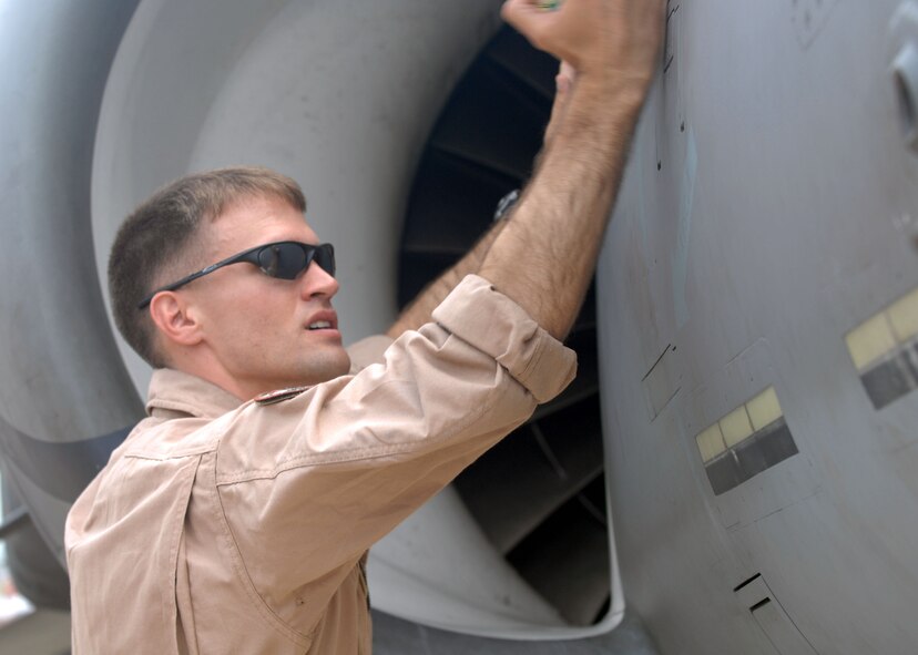 BARKSDALE AIR FORCE BASE, La -- Capt Nick Stewart of the United States Marine Corps looks at a jet on display during the 2008 Defenders of Liberty Air show here May 10. (U.S. Air Force photo by A1C Brittany Y. Bateman) 