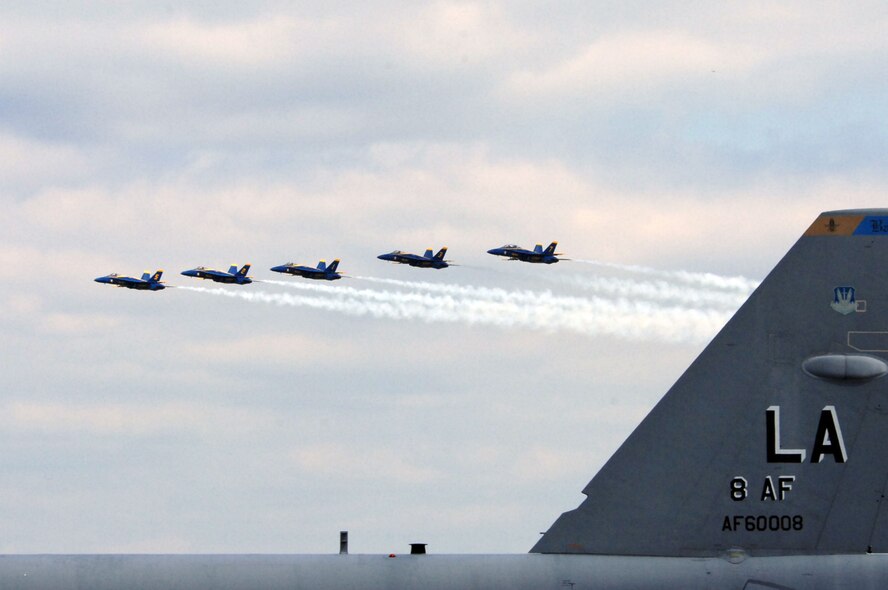 BARKSDALE AIR FORCE BASE, La. -- Members of the Blue Angels, the U.S. Navy's Flight Demonstration Squadron fly past a grounded B-52H Stratofortress  on May 8, prior to the Defenders of Liberty Air Show this weekend. (U.S. Air Force photo by Airman 1st Class Joanna M. Kresge)