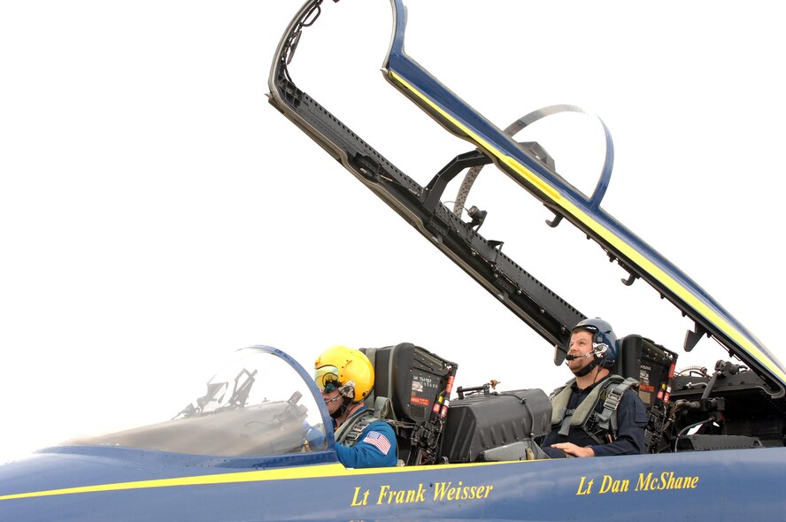 BARKSDALE AIR FORCE BASE, La. -- Lieutenant Frank Weisser of the U.S. Navy Blue Angels, lowers the canopy on his F/A - 18C Hornet prior to taking David McCart from Gap Broadcasting on a media flight on May 8. David is known as the radio personality 'Stiffler' on Shreveport's K94.5 radio station.  (U.S. Air Force photo by Airman 1st Class Joanna M. Kresge)