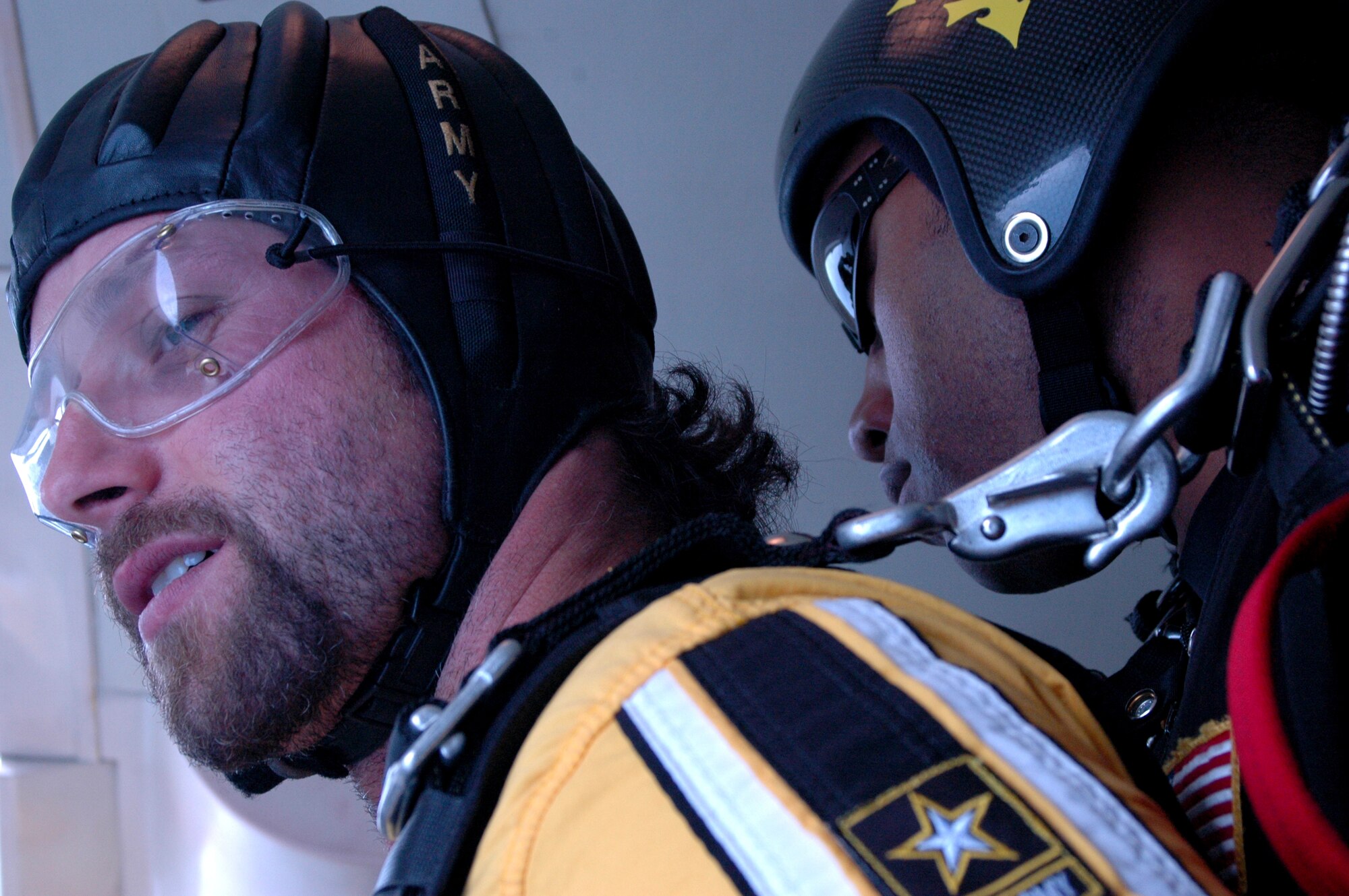 BARKSDALE AIR FORCE BASE, La. -- Chris Brassard, Captain of the Bossier/Shreveport, La. Mudbugs hockey team,  prepares for his first tandem jump with the U.S. Army Golden Knights Parachute Demonstration Team during the Barksdale Defenders of Liberty Air Show. (U.S. Air Force Photo by Amn Allison M. Boehm)