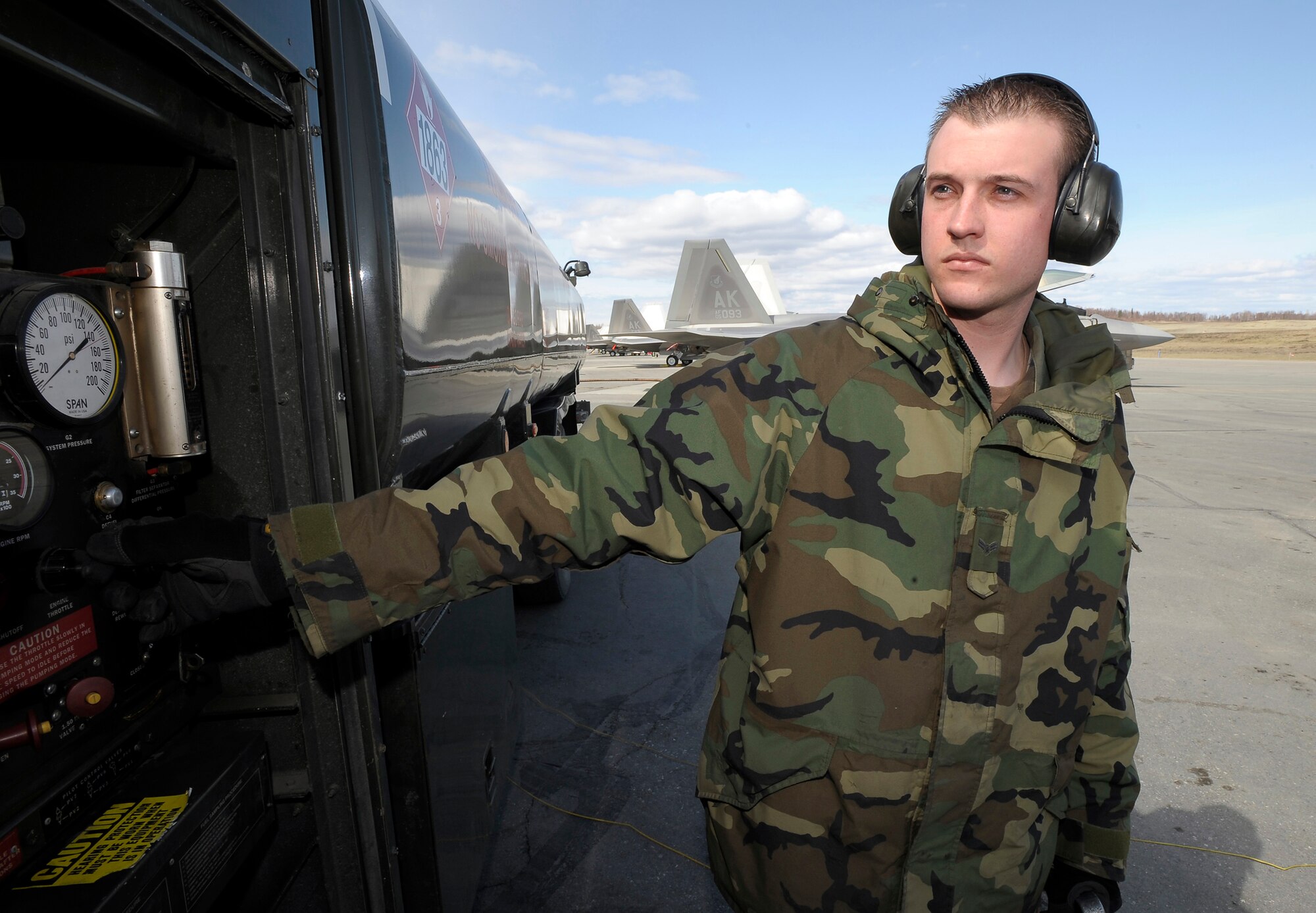 ELMENDORF AIR FORCE BASE, ALASKA – Airman First Class Kyle McWethy starts pumps that will deliver fuel to an F-22 Raptor during Northern Edge '08. Airman McWethy is a fuels specialist and is one of the 5,000 service members involved in the exercise. U.S. Military units stationed in the continental United States and the Pacific theater will participate in exercise Northern Edge 2008, a joint training exercise hosted by Alaskan Command scheduled for May 5-16. Active Duty, Guard and Reserve component Soldiers, Sailors, Airman, Coast Guardsmen, and Marines will participate with over 120 aircraft from all the Services. (U.S. Air Force Photo by Master Sgt Keith Brown)