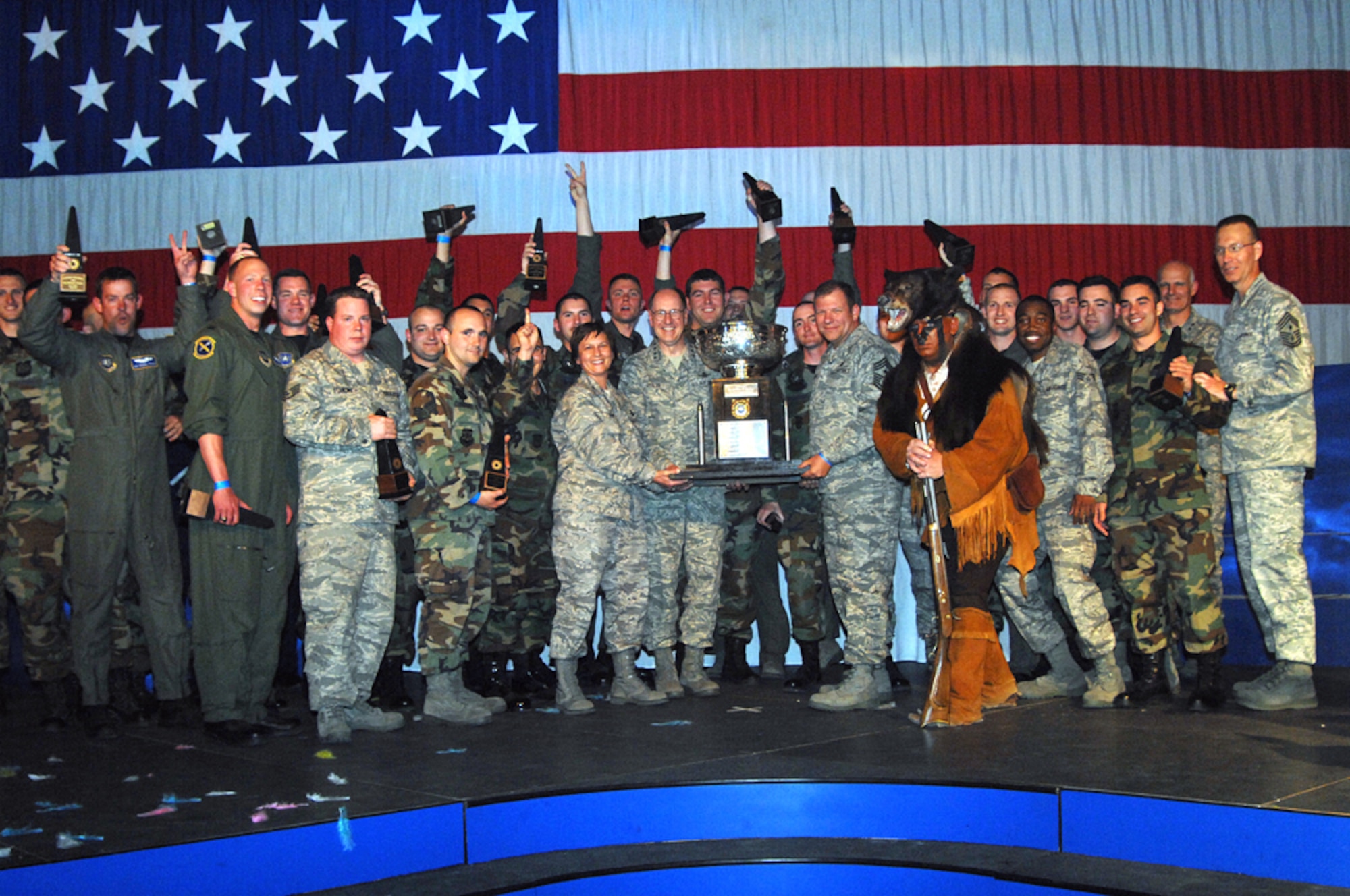 Members of the Guardian Challenge team from the 341st Space Wing at Malmstrom Air Force Base, Mont., celebrate their Blanchard Trophy win here May 9 naming them the Best ICBM Space Wing in Air Force Space Command. Guardian Challenge is the Air Force's premier space and missile competition.  The award presentation took place at Peterson AFB, Colo.  (U.S. Air Force photo/Duncan Wood)