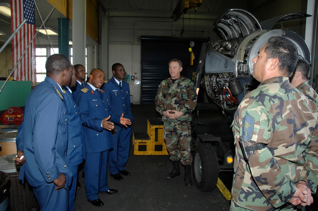 Group Captain Son Igwe, along with members of the Nigerian Air Force, met and toured with 129th Maintenance Group personnel during their visit to the 129th Rescue Wing, Moffett FAF, California Air National Guard. (U.S. Air Force photo/Master Sgt. Dan Kacir)