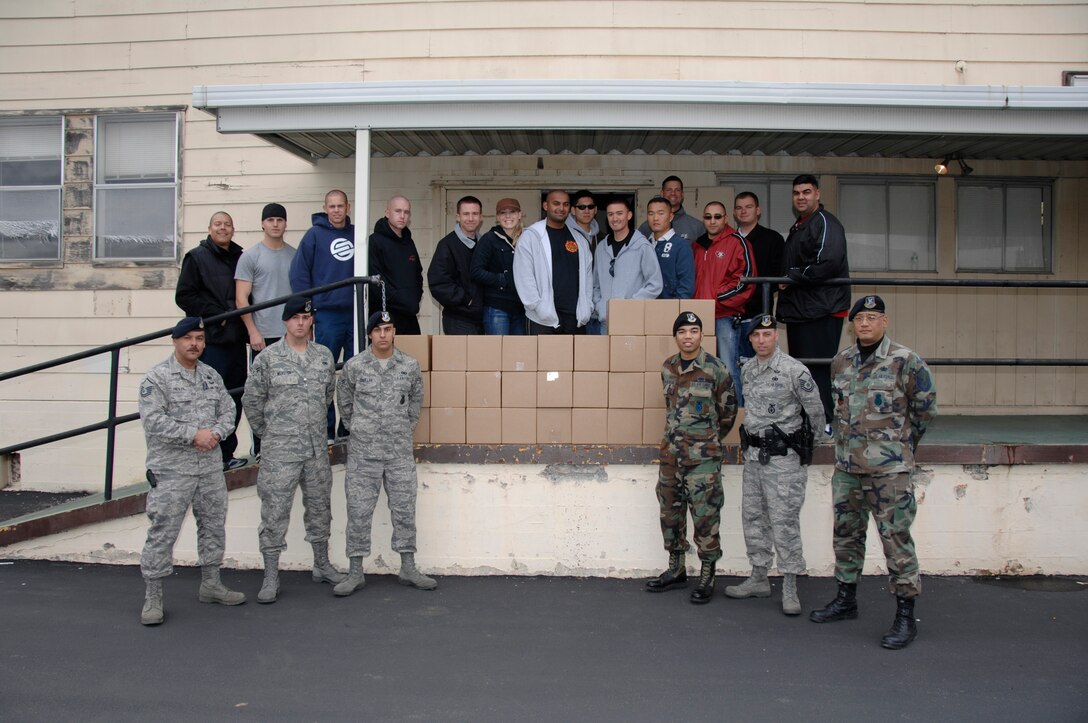 The fourth graduating class of the Santa clara County Justice Training Center, California, delivered over thirty hand packed and carefully boxed "care packages" to be sent to members of the 129th Security Forces deployed to Saudi Arabia. (U.S. Air Force photo/Master Sgt. Dan Kacir)