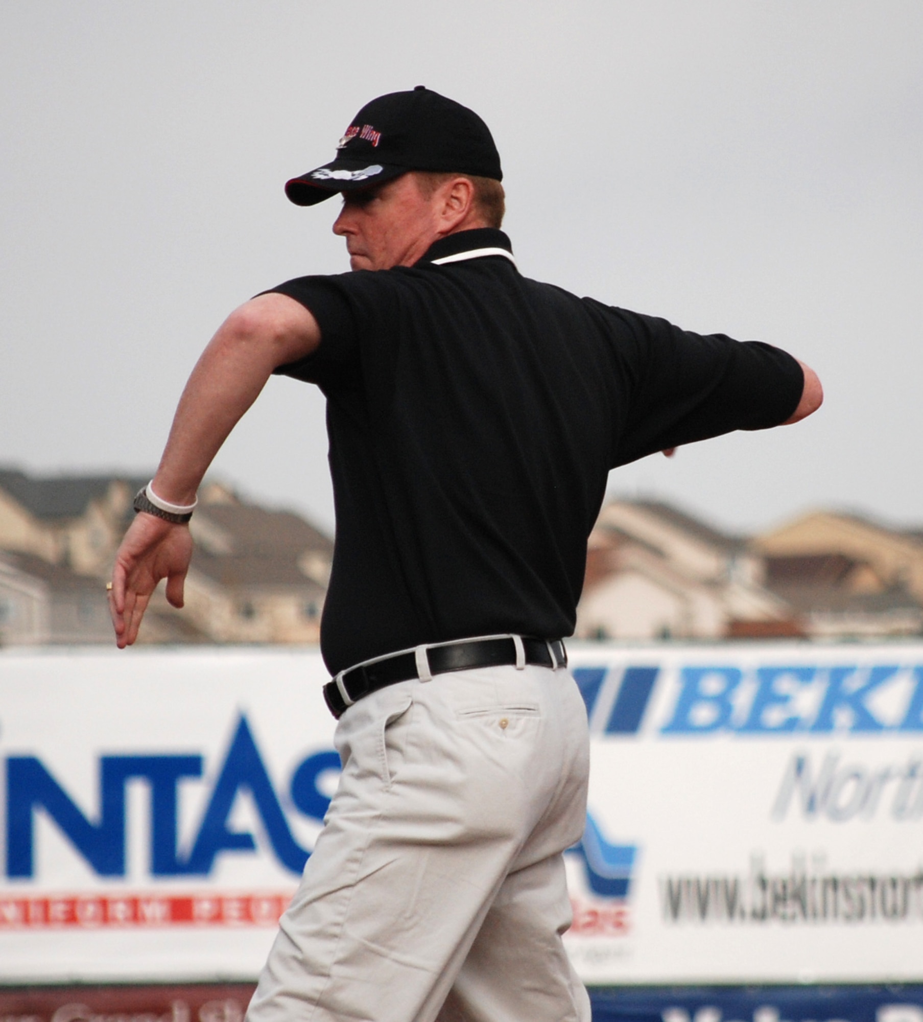 Col. Scott Shepherd, 21st Space Wing vice commander, throws out the first pitch at a Sky Sox game May 9. Colonel Shepherd and leadership from other Front Range bases threw out the ceremonial first pitches in honor of military appreciation night at the stadium. (U.S. Air Force photo/Staff Sgt. Jessica Switzer)