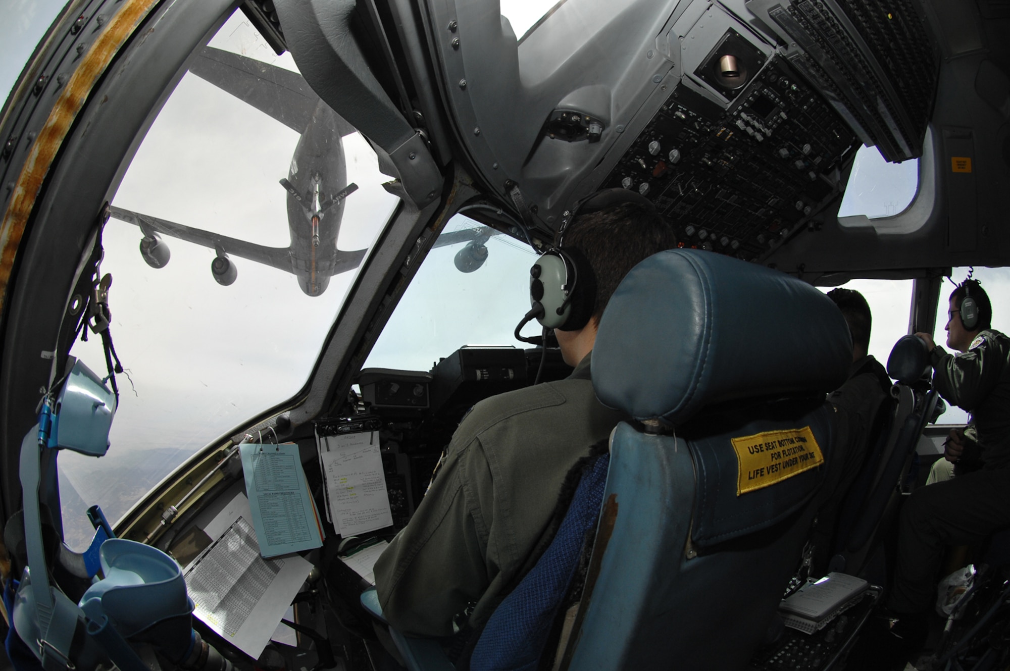 NELLIS AIR FORCE BASE, Nev.--A C-17 Globemaster III prepares to refuel from a KC-135 Stratotanker over the Nevada Test Range during the U.S. Air Force Weapons School Mobility Air Forces Exercise here May 9. The Weapons School holds MAFEX twice a year to test the ability of C-17A Globemaster III and C-130 Hercules aircrews from 12 Air Force bases around the world to join together in a formation at a specific time and location to insert ground forces anywhere in the world. (U.S. Air Force photo/Master Sgt. Robert W. Valenca)