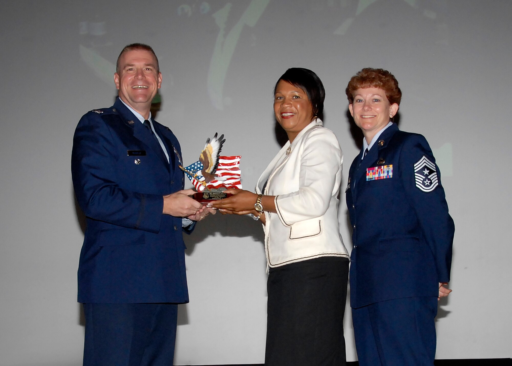 Col, Kris Beasley, 82nd Training Wing vice commander, presents Stephanie Shorts, 82nd Mission Support Group, with the Civilian Supervisory of the Quarter, category I, award May 6. (U.S. Air Force photo/Mike Litteken)