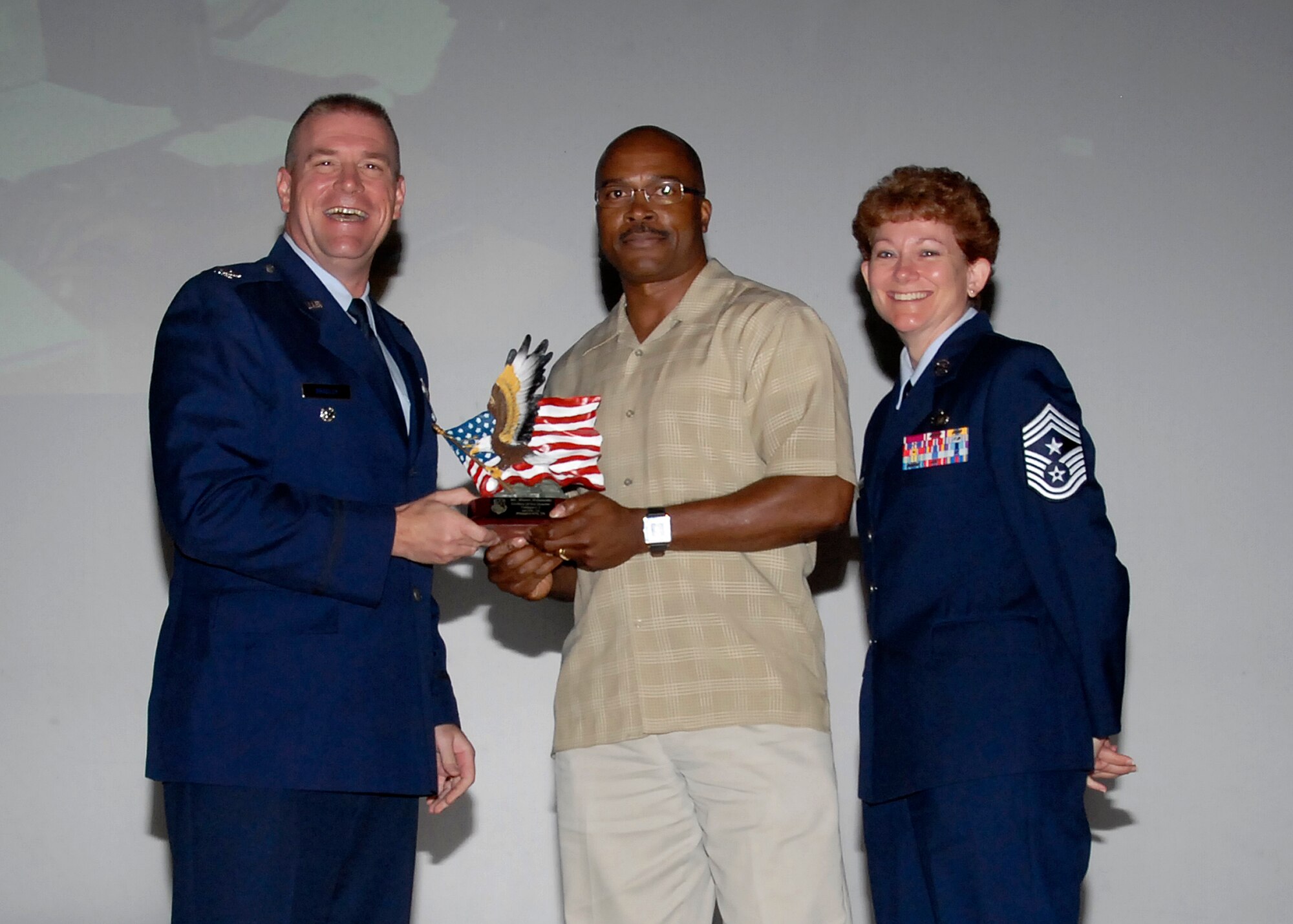 Col, Kris Beasley, 82nd Training Wing vice commander, presents Martin Edwards, 82nd Mission Support Group, with the Civilian of the Quarter, category II, award May 6. (U.S. Air Force photo/Mike Litteken)