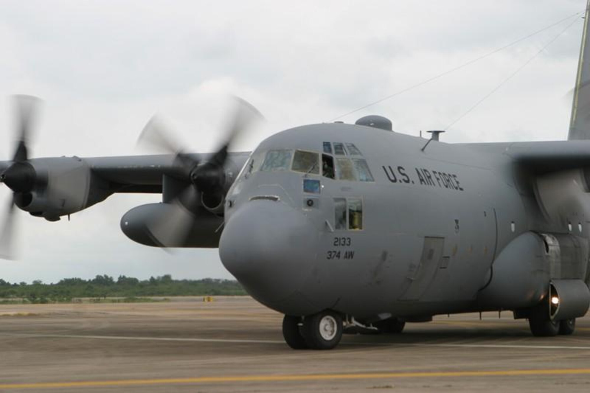 UTAPHAO, Thailand-- A U.S. Air Force C-130 Hercules stocked with supplies humanitarian relief takes off from Utaphao International Airport in Pattaya, Thailand on 12 May to deliver relief supplies to Burma. The Air Force is part of Joint Task Force Caring Response, a multi-service humanitarian sssistance and disaster relief effort for Burmese citizens devastated by Cyclone. Nargis. (U.S. Marine photo by L. Corporal Robert Harding)