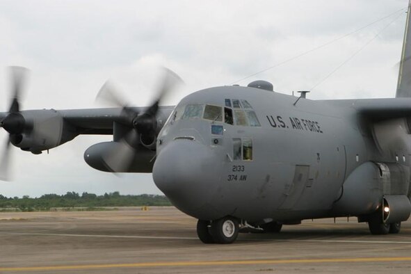 UTAPAO, Thailand-- A U.S. Air Force C-130 Hercules stocked with supplies humanitarian relief takes off from Utaphao International Airport in Pattaya, Thailand on 12 May to deliver relief supplies to Burma. The Air Force is part of Joint Task Force Caring Response, a multi-service humanitarian sssistance and disaster relief effort for Burmese citizens devastated by Cyclone Nargis. (U.S. Marine photo by L. Corporal Robert Harding) 