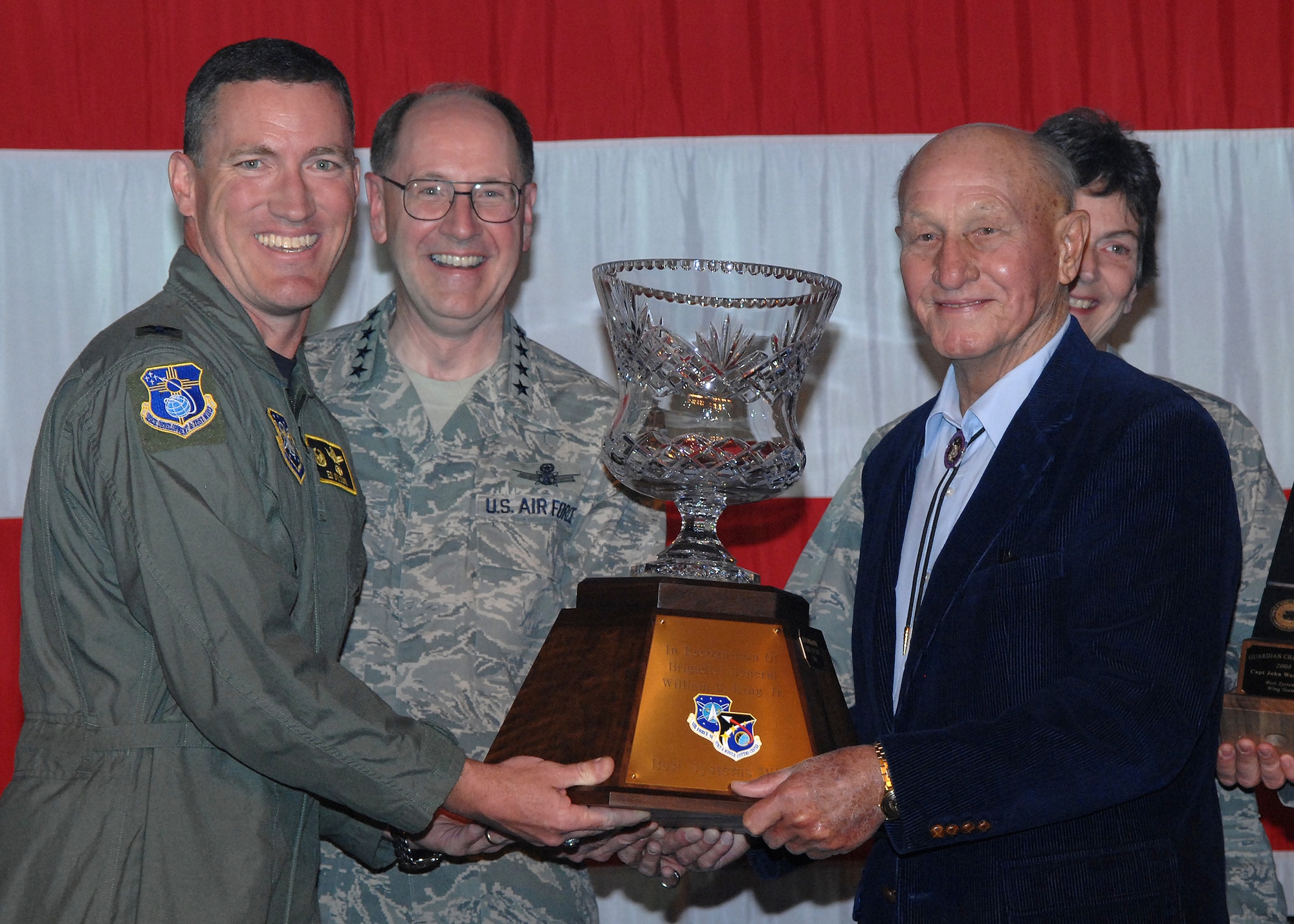 PETERSON AIR FORCE BASE, Colo. -- Members of the Space Development and Test Wing at Kirtland AFB, N.M., Guardian Challenge team celebrate their King Trophy win here May 9 naming them the Best Systems Wing in Air Force Space Command. (U.S. Air Force photo by Duncan Wood)