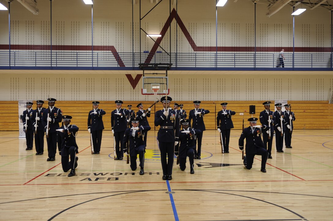 The Air Force Honor Guard Drill team finishes their perfomance in a 16-man formation here, May 12, as part of their Northern Tier Tour. The Air Force Honor Guard Drill Team tours world-wide to public and military venues to recruit, retain and inspire Airmen. (U.S. Air Force photo by Airman 1st Class Kasey Zickmund)