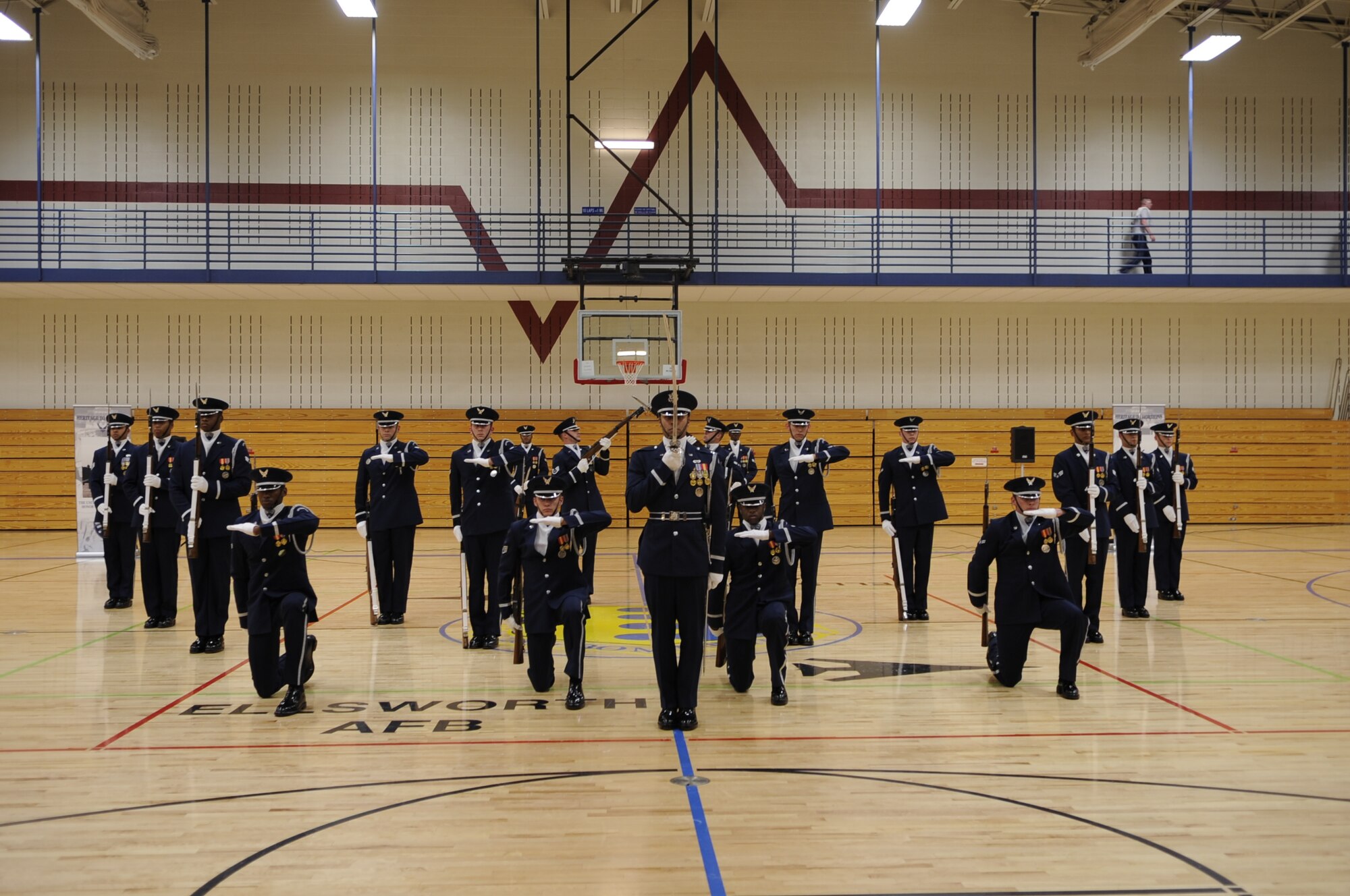 The Air Force Honor Guard Drill team finishes their perfomance in a 16-man formation here, May 12, as part of their Northern Tier Tour. The Air Force Honor Guard Drill Team tours world-wide to public and military venues to recruit, retain and inspire Airmen. (U.S. Air Force photo by Airman 1st Class Kasey Zickmund)