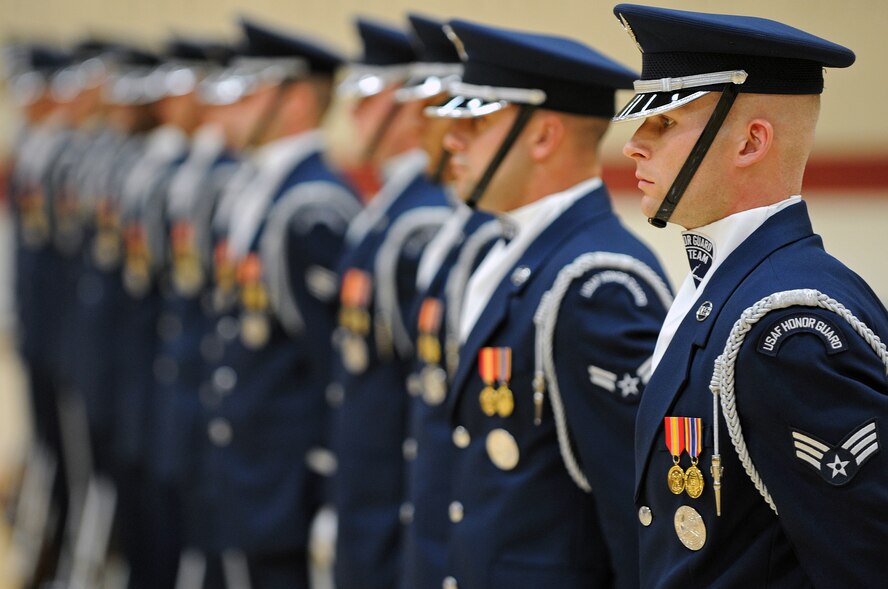 The Air Force Honor Guard Drill Team demonstrates their line drill sequence during a performance at the Bellamy Fitness Center, May 12. The Air Force Honor Guard Drill Team tours world-wide to public and military venues to recruit, retain and inspire Airmen; their stop at Ellsworth is part of their Northern Tier Tour. (U.S. Air Force photo/Senior Airman Marc I. Lane)
