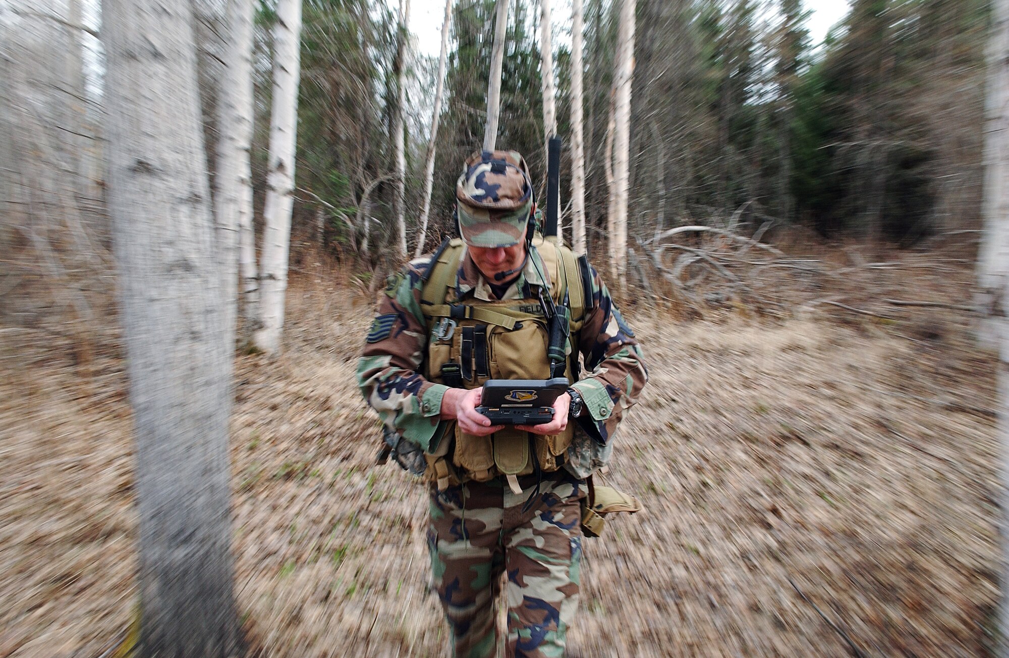 Tech. Sgt. Sean Field tests the new experimental MR-1 small computer in the field by navigating to the specific global positioning satellite coordinate May 12, 2008, at Eielson Air Force Base, Alaska during Northern Edge 08 exercise. After several tests, they are providing feedback on how the equipment worked and if any improvements could be made before the equipment will be used in combat situations years from now. Northern Edge is a joint training exercise hosted by Alaskan Command and is one of a series of U.S. Pacific Command exercises that prepare joint forces to respond to crises in the Asian Pacific region. Airman Parker is a TACP assigned to Detachment 1, 3rd Air Support Operation Squadron from Fort Richardson, Alaska. (U.S. Air Force Photo/Airman 1st Class Jonathan Snyder)
