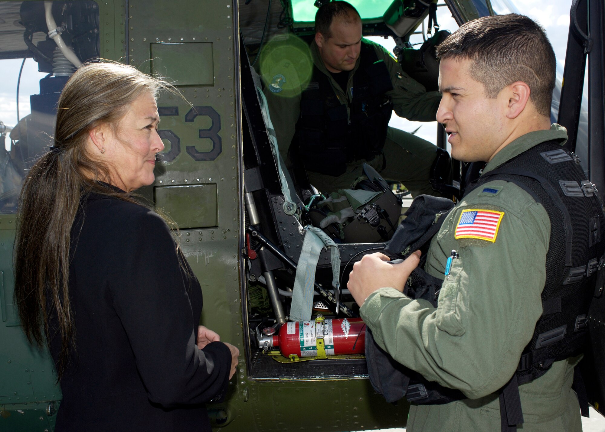FAIRCHILD AIR FORCE BASE, Wash. – Mary Verner, Spokane City mayor, and 1st Lt. Mark Morales, 36th Rescue Flight pilot, discuss how the 36th rescue flight contributes to Fairchild’s mission after a ride in a UH1 helicopter May 9. Mary Verner was one of seven Honorary Commanders who visited Fairchild. (U.S. Air Force photo / Airman 1st Class Melissa Barnett)