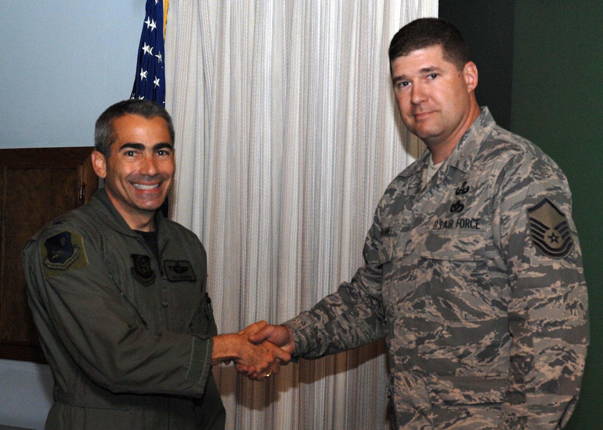 CANNON AIR FORCE BASE, N.M.-- Master Sgt. Garet Vannes, 27th Special Operations Civil Engineer Squadron, receives the 2008 Commander-In-Chief's IEA (Special Recognition Category)  Award presented by Col. Valentino Bagnani III, 27th Special Operation Wing vice commander. Sergeant Vannes received the award at the weekly wing staff meeting on May 13. (U.S. Air Force photo by Airman 1st Class Danielle Martin)