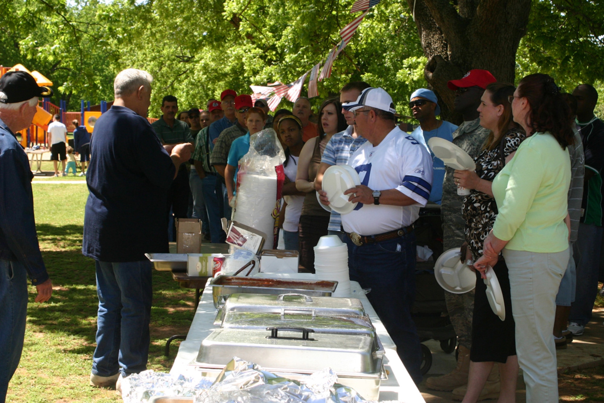 Mr. Curley Huddleston addresses family, friends and members of the 307th Red Horse Squadron and 360th Chemical Army Guard unit at the welcome home picnic at Mike Woods Park in Bossier City, LA, Saturday, May 3, 2008. The event was arranged in part Huddleston and VFW Post 5951 for members of both units who recently returned from service in Iraq. (U.S. Air Force photo/Tech. Sgt. Jeffrey S. Walston)