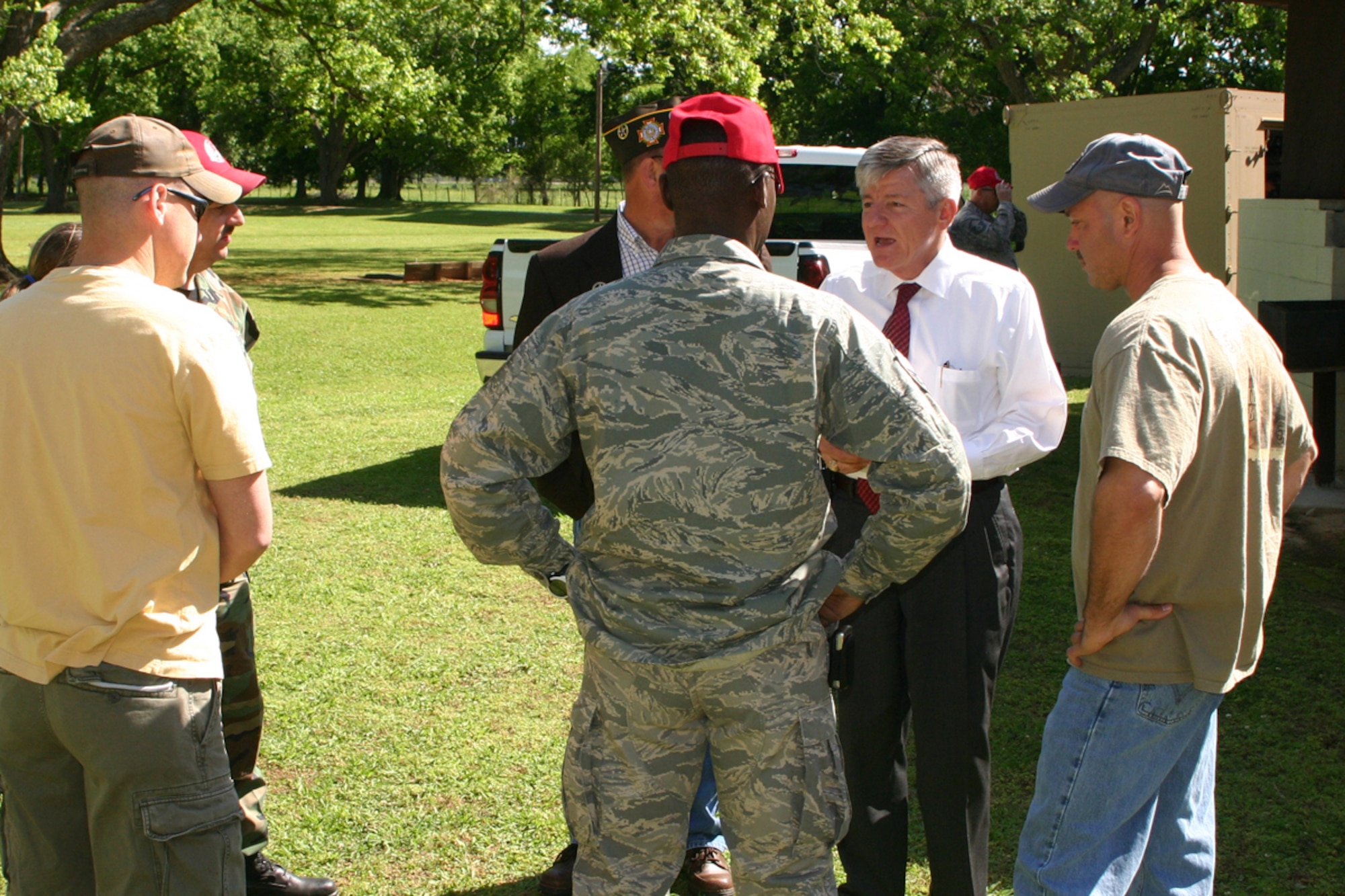 Secretary, Louisiana Department of Veterans Affairs, Lane A. Carson, speaks with members of the 307th Red Horse Squadron and 360th Chemical Army Guard Unit about veterans benefits during the welcome home picnic at Mike Woods Park in Bossier City, LA, Saturday, May 3, 2008. The event was arranged in part by Curley Huddleston and VFW Post 5951 for members of both units who recently returned from service in Iraq. (U.S. Air Force photo/Tech. Sgt. Jeffrey S. Walston)
