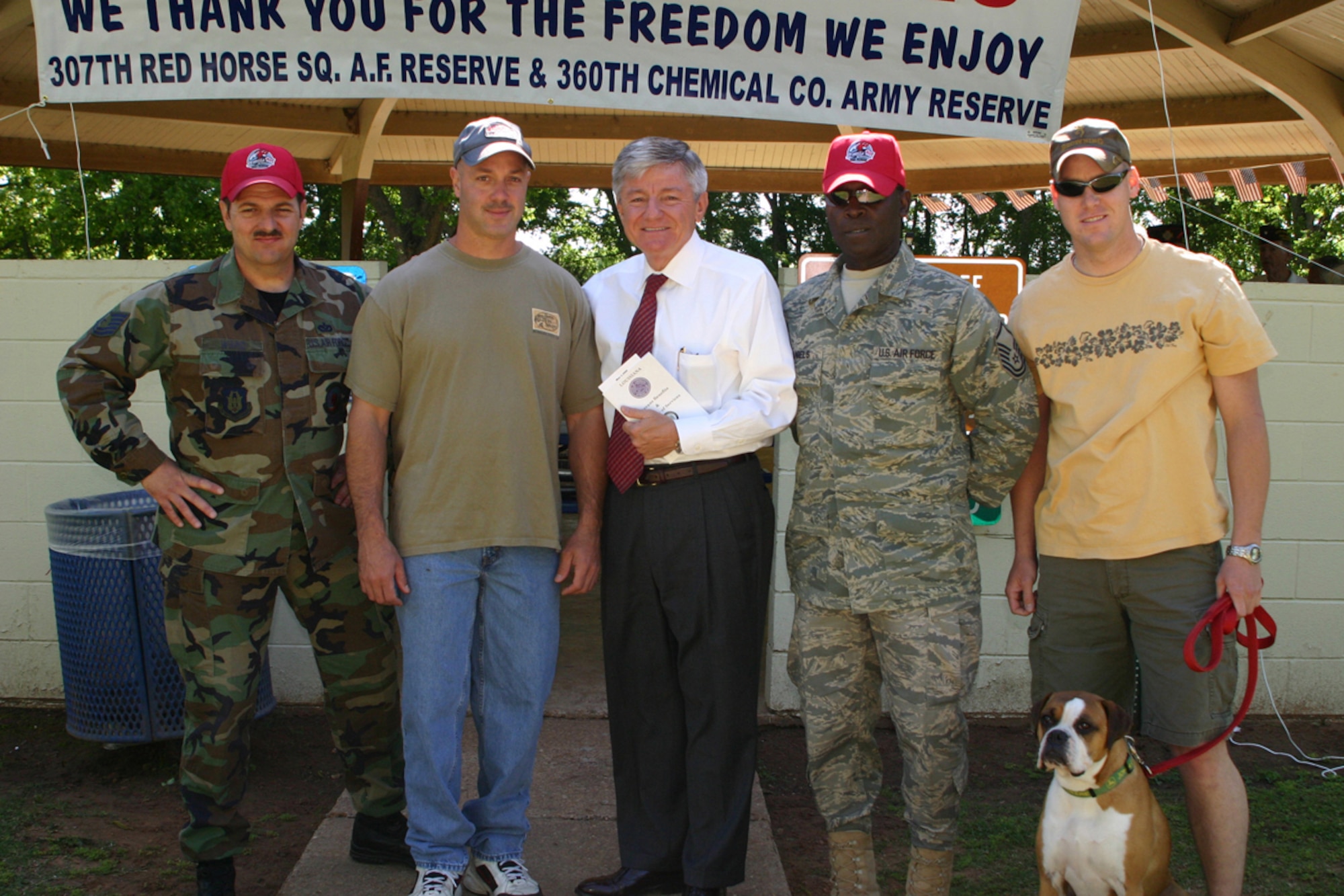 Secretary,Louisiana Department of Veterans Affairs, Lane A. Carson poses with members of the 307th Red Horse Squadron and 360th Chemical Army Guard Unit during the welcome home picnic at Mike Woods Park in Bossier City, LA, Saturday, May 3, 2008. The event was arranged in part by Curley Huddleston and VFW Post 5951 for members of both units who recently returned from service in Iraq. (US Air Force photo/Tech. Sgt. Jeffrey S. Walston)