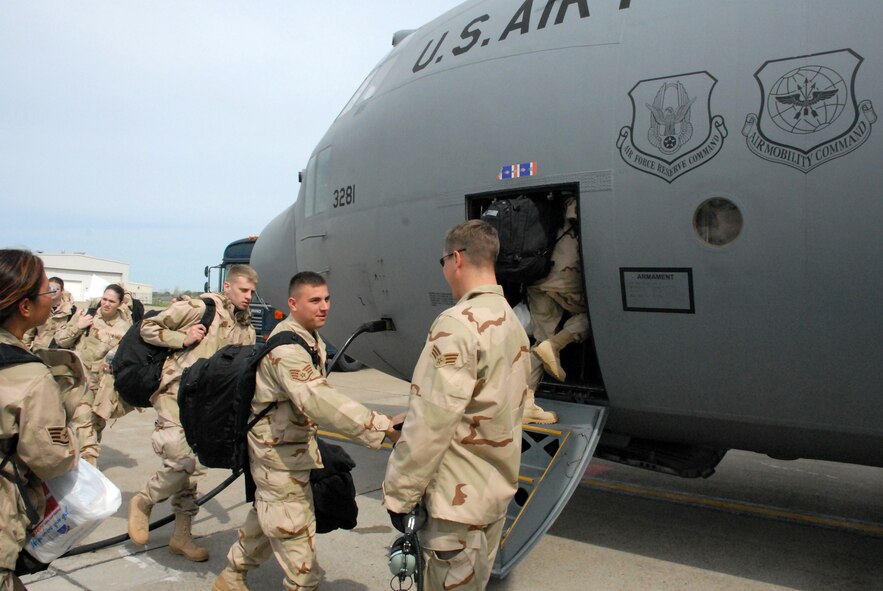 NIAGARA FALLS AIR RESERVE STATION, N.Y. - Flight operations and maintenance personnel from the 914th Airlift Wing board a unit C-130 aircraft bound for Southwest Asia.  These Niagara reservists are deploying in support of Operation Iraqi Freedom.  (U.S. Air Force photo / Master Sgt. Peter Borys)