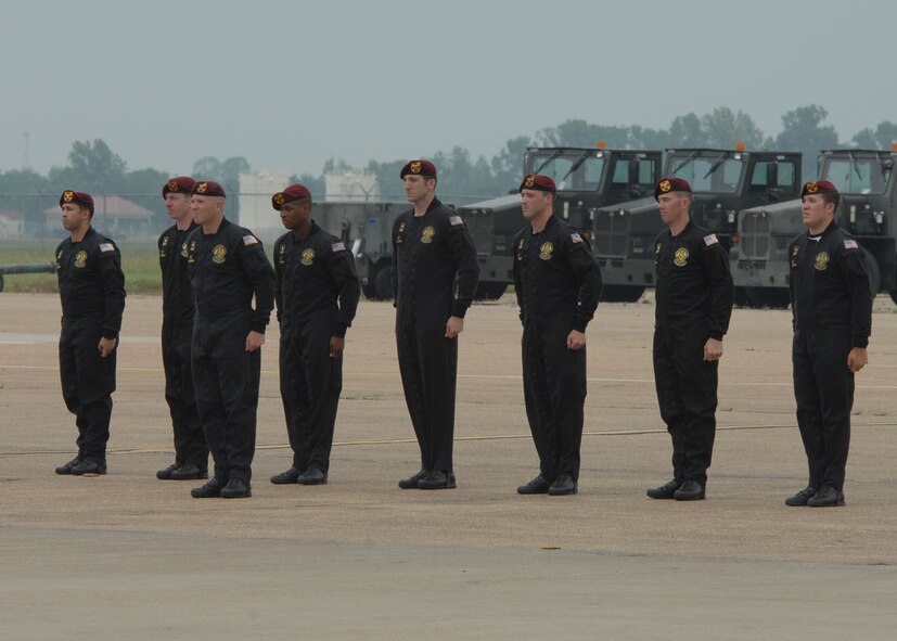 BARKSDALE AFB , La.—Members of the U.S. Army Golden Knights Parachute Demonstration Team form up on the flight line here after a sky dive performance during the Defenders of Liberty Air Show.  The air show commemorates the 75th anniversary of Barksdale Air Force Base. (U.S. Air Force photo by Airman 1st Class Brittany Bateman)