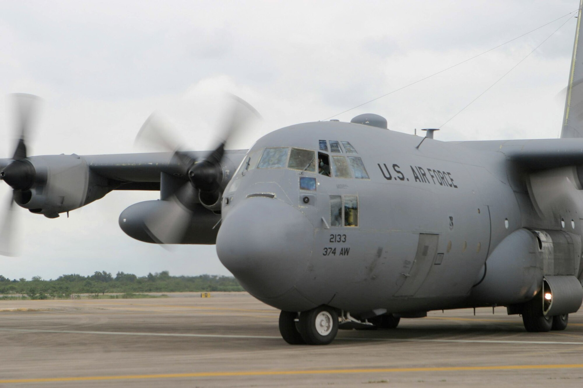 A C-130 Hercules stocked with supplies prepares to take off May 12 from Utapao Air Base, Thailand. The aircraft flew to Burma as part of Joint Task Force Caring Response, the joint humanitarian assistance and disaster relief response to Tropical Cyclone Nagris. (U.S. Marine photo/Lance Cpl. Robert A. Harding)