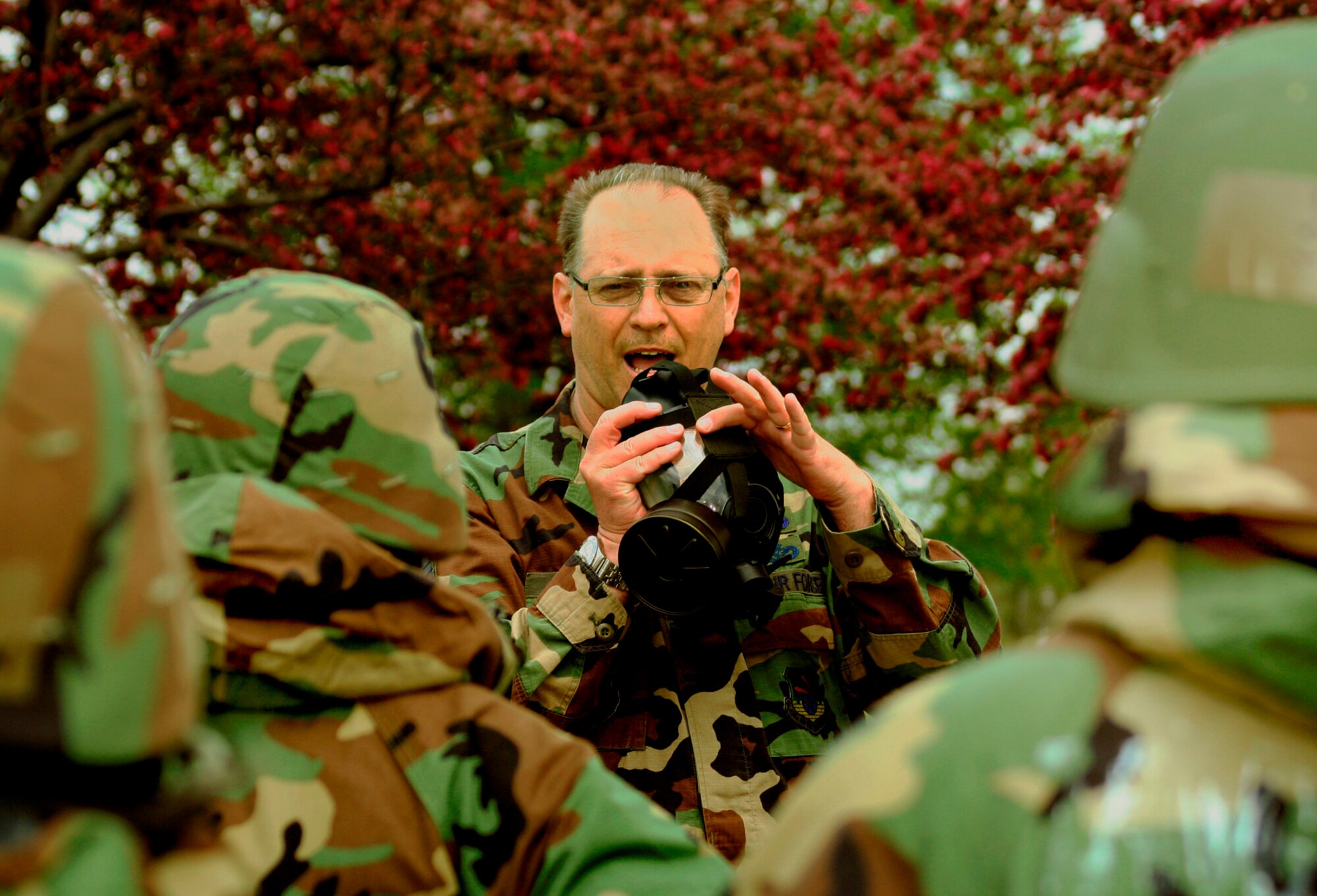 GRISSOM AIR RESERVE BASE, Ind., -- Master Sgt. Tim Cahill, a member of the 434th Air Refueling Wing ground safety office, demonstrates the proper way to prepare a gas mask for storage.  Members of the 434th ARW receive intense training on the proper wear of gas masks and chemical warfare suits as part of their overall combat skills.  (U.S. Air Force Photo/Tech. Sgt. Patrick Kuminecz)