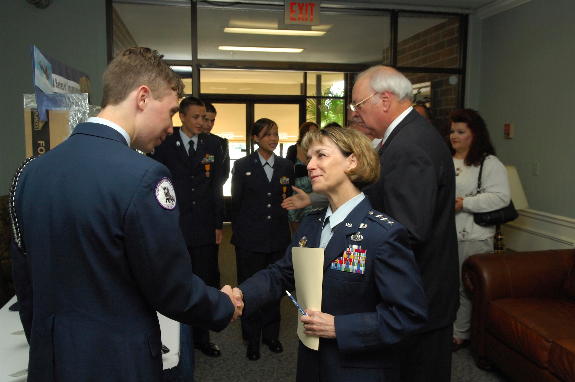 SHAW AIR FORCE BASE, S.C.-- Lt. Gen. Terry Gabreski, Air Force Material Command vice commander and the highest ranking female officer in the Air Force, shakes the hand of Shane Syromi, a Crestwood High School student after judging his JROTC project as part of the South Carolina State Air Force Association Convention activities held at Shaw May 10. (U.S. Air Force photo/Tech. Sgt. Josef Cole)