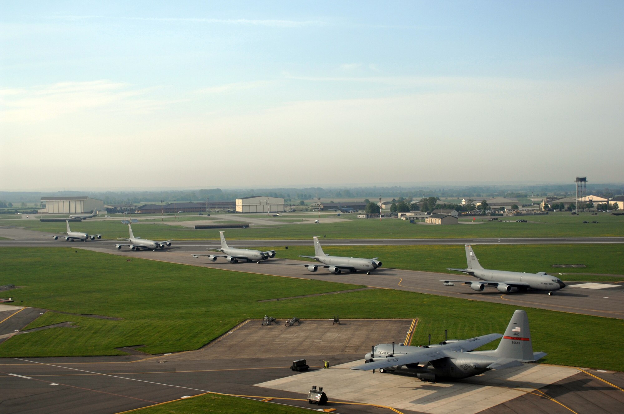 Early Friday morning at RAF Mildenhall, England, more than half the fleet of KC-135R Stratotankers assigned to the base performed a massive-rapid response exercise. The event, which involved the launching of eight refueling aircraft, benefitted two parts of the installation’s flying community. Airmen assigned to the maintenance squadrons were able to test their abilities to launch several aircraft simultaneously while the refueling squadrons took advantage of the large number of aircraft in the air by performing formation flights. The last time a large-scale take-off of this kind took place was on March 13, 2006, when seven KC-135R aircraft crews participated. (U.S. Air Force photo by Master Sgt. Sarah Frankenhoff)