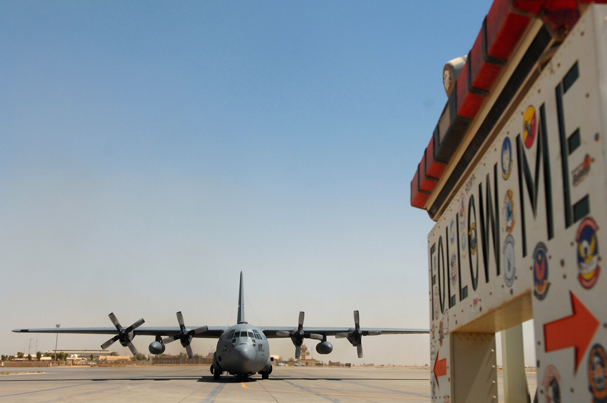 Airmen of the 332nd Expeditionary Maintenance Squadron transient alert shop coordinate the ground movement of all aircraft that land May 10 at Balad Air Base, Iraq. Their duties include coordinating aircraft parking positions, fulfilling refueling and maintenance needs, and orchestrating passenger transportation to and from aircraft. (U.S. Air Force photo/Senior Airman Julianne Showalter) 