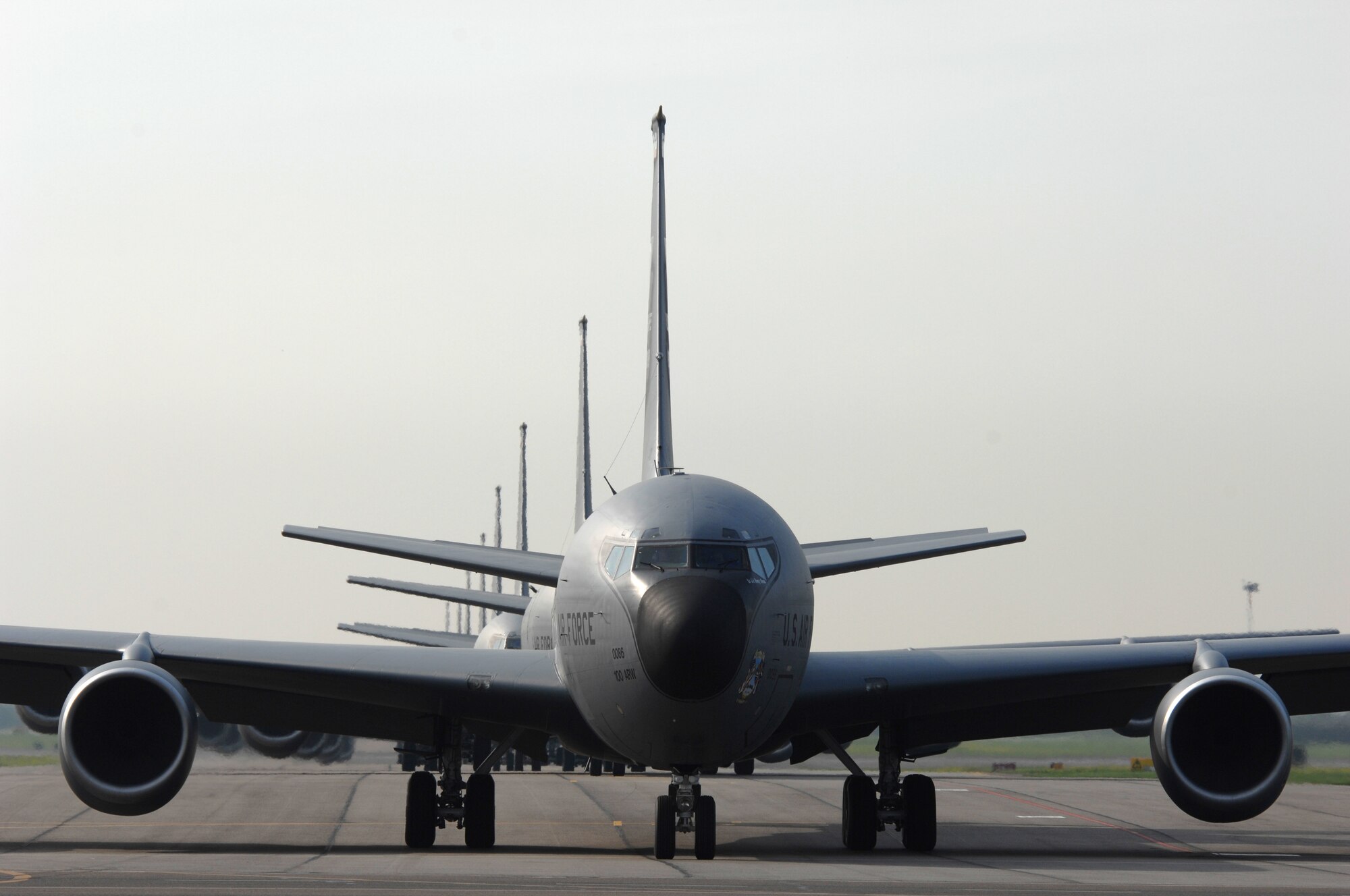 Early Friday morning at RAF Mildenhall, England, more than half the fleet of KC-135R Stratotankers assigned to the base performed a massive-rapid response exercise. The event, which involved the launching of eight refueling aircraft, benefitted two parts of the installation’s flying community. Airmen assigned to the maintenance squadrons were able to test their abilities to launch several aircraft simultaneously while the refueling squadrons took advantage of the large number of aircraft in the air by performing formation flights. The last time a large-scale take-off of this kind took place was on March 13, 2006, when seven KC-135R aircraft crews participated. (U. S. Air Force photo by Master Sgt. Tracy L. DeMarco)
