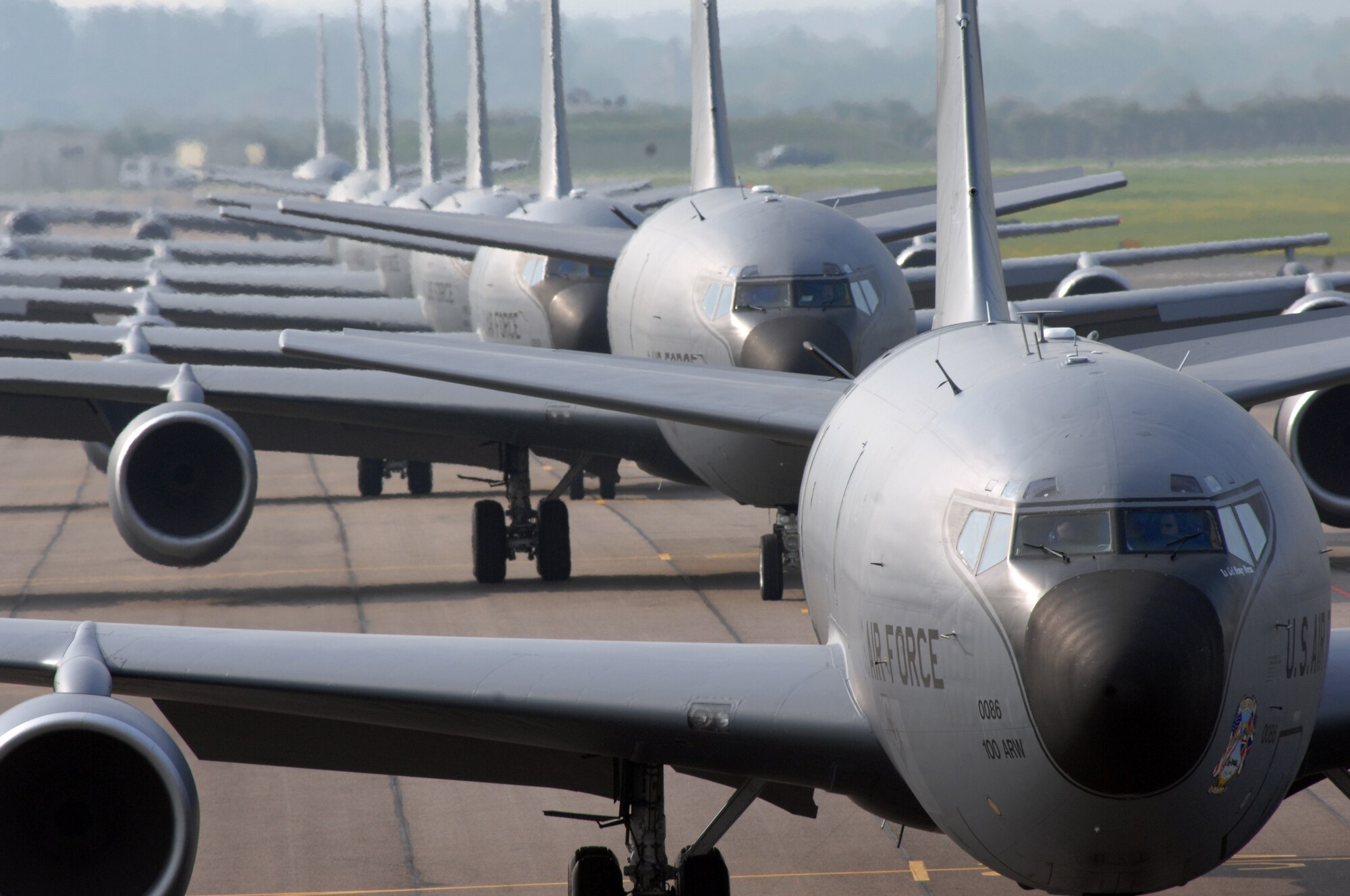 Early Friday morning at RAF Mildenhall, England, more than half the fleet of KC-135R Stratotankers assigned to the base performed a massive-rapid response exercise. The event, which involved the launching of eight refueling aircraft, benefitted two parts of the installation’s flying community. Airmen assigned to the maintenance squadrons were able to test their abilities to launch several aircraft simultaneously while the refueling squadrons took advantage of the large number of aircraft in the air by performing formation flights. The last time a large-scale take-off of this kind took place was on March 13, 2006, when seven KC-135R aircraft crews participated. (U.S. Air Force photo by Senior Airman Teresa Hawkins)