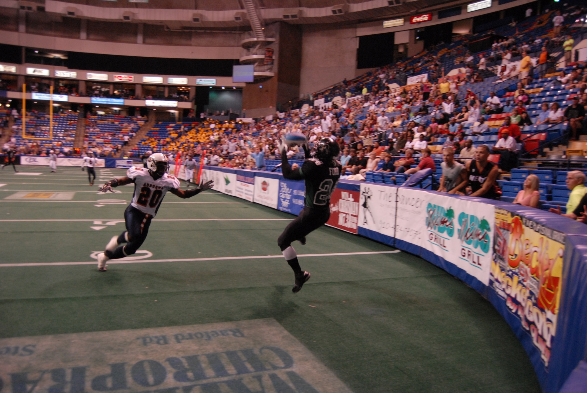Fayetteville Guard receiver Walter Ford makes a touchdown catch during the Guard's Operation Welcome Home game against the Augusta Colts May 10. (U.S. Air Force Photo by 2nd Lt. Chris Hoyler)