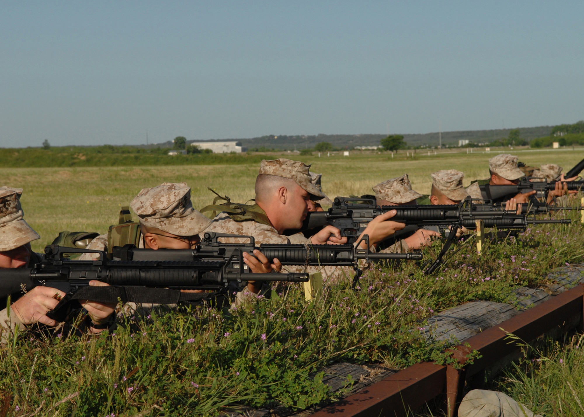 MINERAL WELLS, Texas -- Marines from Detachment 1 Motor T Maintenance Company, prepare to BZO their weapons May 9, 2008. To get the best shot the Marines must adjust their front site to better align their M-16 with their field of vision. (U.S Air Force photo by Airman 1st Class Jennifer Romig)