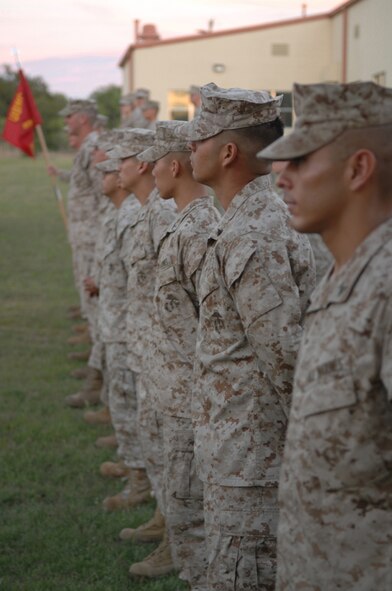 MINERAL WELLS, Texas -- Marines from Detachment 1 Motor T Maintenance Company, stand at ease in formation May 8, 2008. The Marines had to be briefed about the weekend ahead of them at the rifle range located in Mineral Wells, Texas. The briefing was to ensure everyone knew what was expected of them and safety precautions that needed to be folllowed. (U.S. Air Force photo by Airman 1st Class Jennifer Romig)