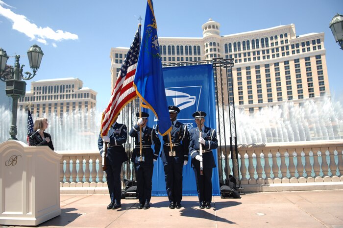 LAS VEGAS—Airmen from the Nellis AFB Honor Guard present the colors before the Frank Sinatra Commemorative Stamp First-Day-of-Issue Ceremony outside the Bellagio Resort and Casino here May 13. The 42-cent, first class stamp was also launched in New York and Hoboken, N.J. (U.S. Air Force photo/Senior Airman Jason R. Huddleston)