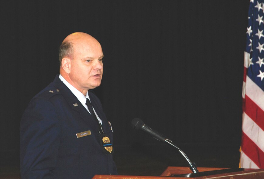 Brigadier General Dana Simmons, commander, Air Force Office of Special Investigations, presides over a memorial ceremony for the AFOSI Hall of Heroes on May 13. (U.S. Air Force photo/Tech. Sgt. John Jung)