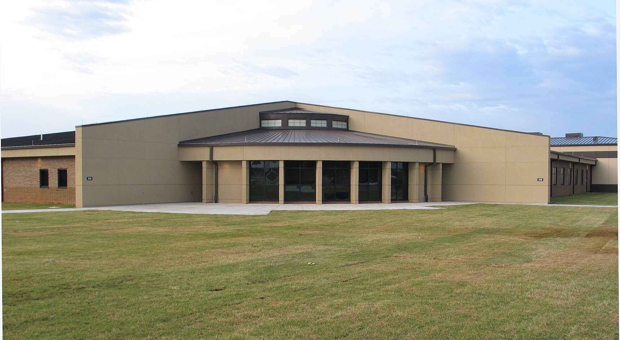 The new Civil Engineering complex was officially opened with a ribbon cutting, May 9. The complex now houses offices consolidated from 15 older buildings for efficiency and energy savings. (U.S. Air Force/Michael Fletcher)
