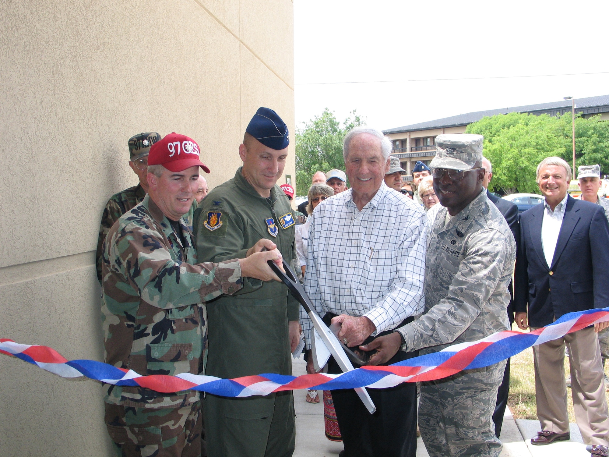 The new Civil Engineering complex was officially opened with a ribbon cutting, May 9. The complex now houses offices consolidated from 15 older buildings for efficiency and energy savings. (U.S. Air Force/A1C Cherice Bryant)
