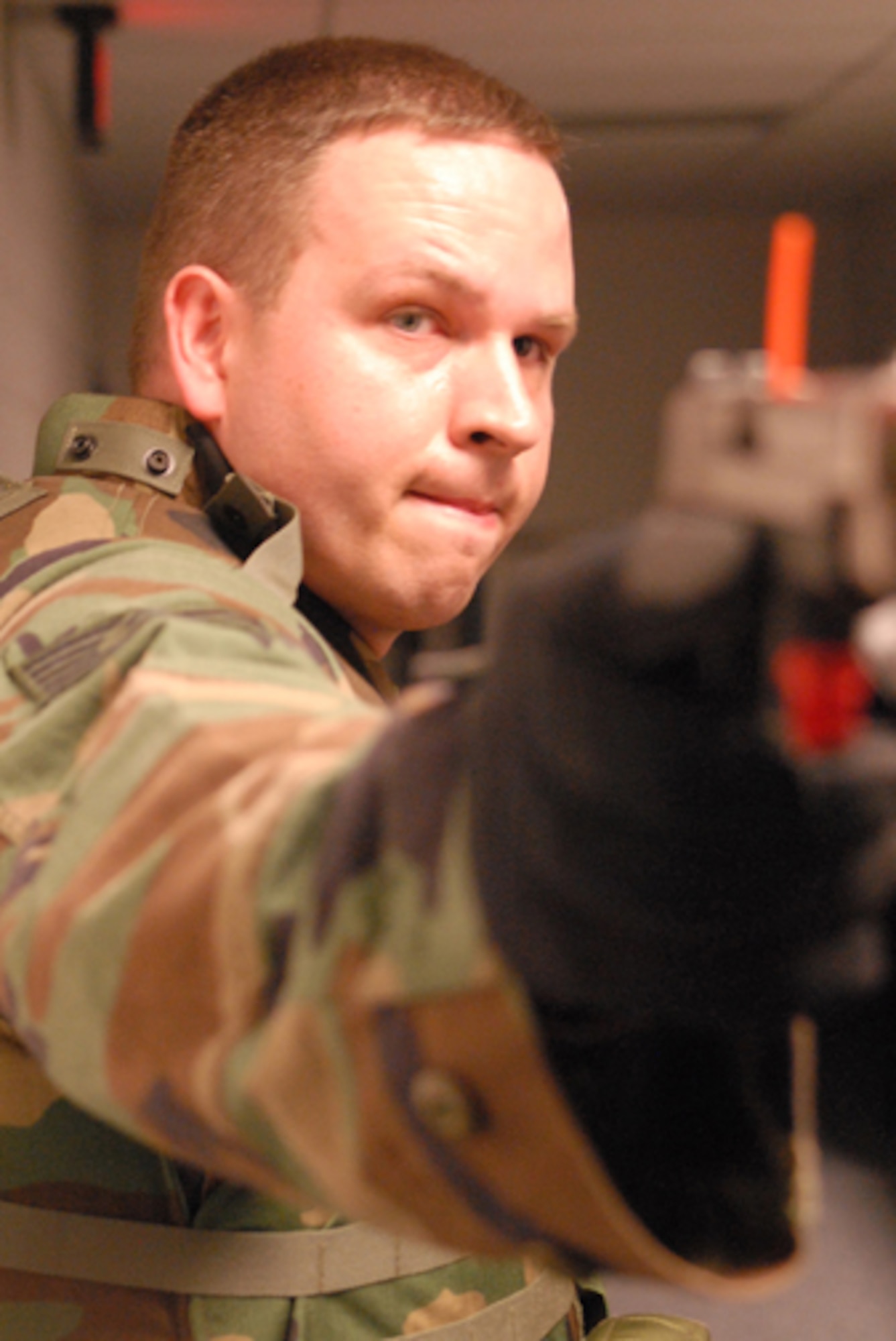 Technical Sergeant Scott Batch practices his tactical moves for anti-terrorism  training with the Security Police from 180th Fighter Wing Air National Guard from Swanton, Ohio at the campus of Owens State Community College in Toledo, Ohio on April 13, 2008.  Air Force Photo by Senior Airman Jodi L. Joice. (Released)  
