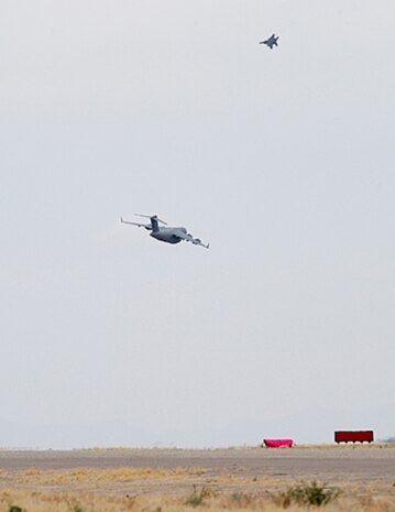 Nearly 40 aircraft from bases around the country participated in the 57th Weapons Squadron's Mobility Air Forces Exercise over the Nevada Test and Training Range May 9. The exercise scenario involved simulated airdrops of cargo and personnel, airland operations, aerial refuelings, and combat support provided by A-10s, F-15Es and F-16s. (U.S. Air Force photo)