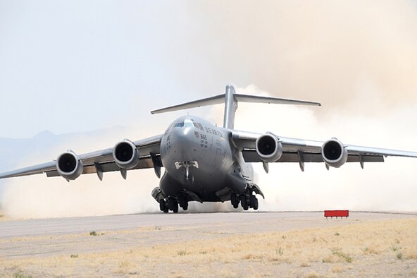 Nearly 40 aircraft from bases around the country participated in the 57th Weapons Squadron's Mobility Air Forces Exercise over the Nevada Test and Training Range May 9. The exercise scenario involved simulated airdrops of cargo and personnel, airland operations, aerial refuelings, and combat support provided by A-10s, F-15Es and F-16s. (U.S. Air Force photo)