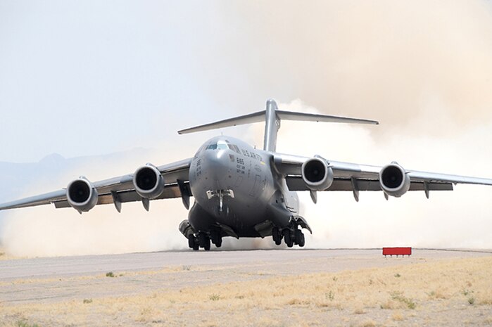 Nearly 40 aircraft from bases around the country participated in the 57th Weapons Squadron's Mobility Air Forces Exercise over the Nevada Test and Training Range May 9. The exercise scenario involved simulated airdrops of cargo and personnel, airland operations, aerial refuelings, and combat support provided by A-10s, F-15Es and F-16s. (U.S. Air Force photo)