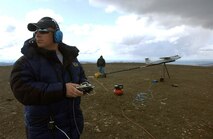 Red Jensen prepares to launch the prototype of the Arcturus unmanned aerial vehicle May 7 during Northern Edge 2008, at a test site in the Pacific Alaska Range Complex. The UAV is a brainchild of the Air Force Research Laboratory and is designed for a myriad of aerial reconnaissance, monitoring and communications duties. Mr. Jensen is the chief pilot for the Arcturus UAV. (U.S. Marine photo/Sgt. Rocky Smith) 