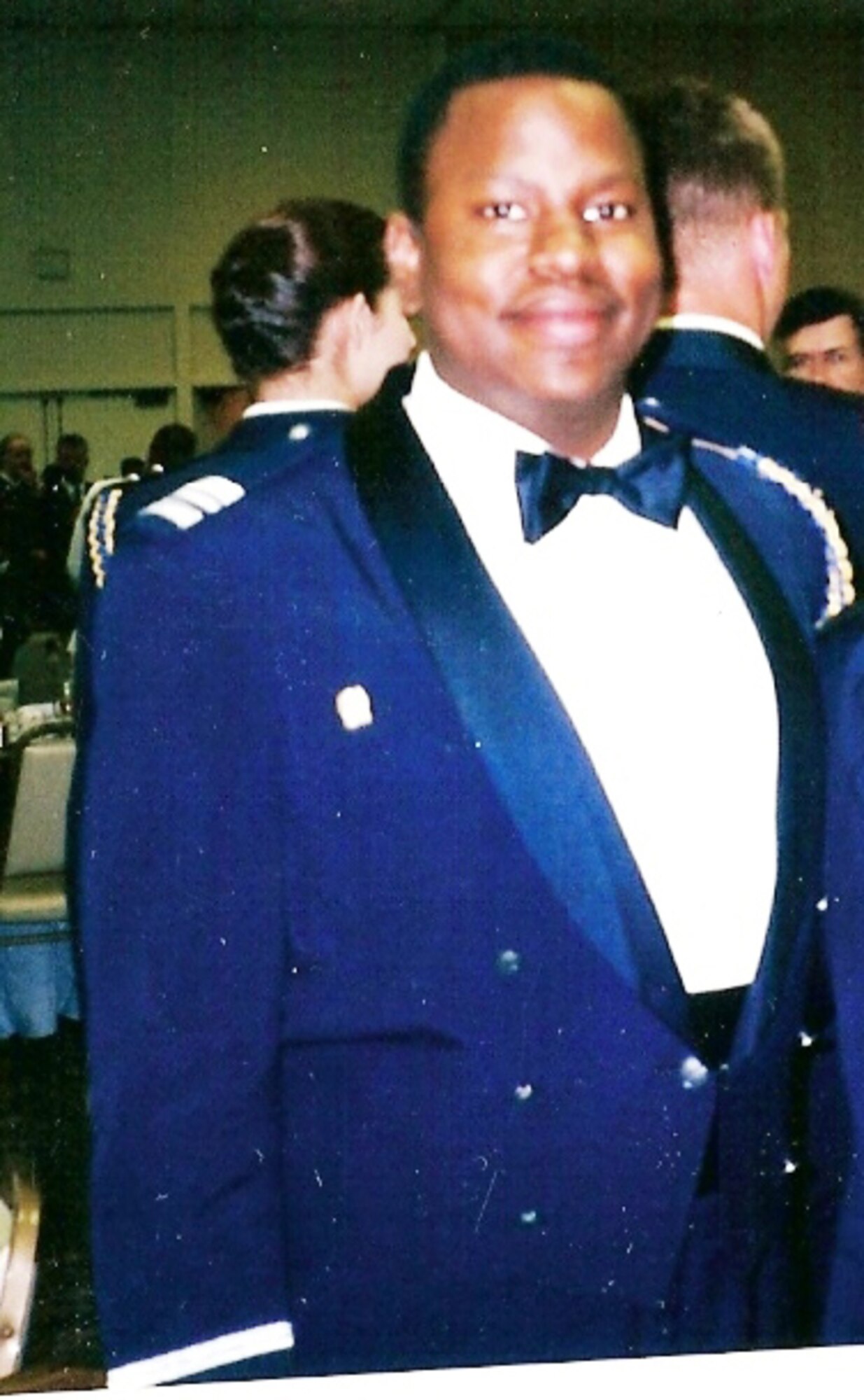 WHITEMAN AIR FORCE BASE, Mo. – Micheal Boswell poses for a picture at a dinner more than two years prior to the 2008 Natural Southern States Classic body building competition at Liberty, Mo. Captain Boswell, 509th Logistics Readiness Squadron, lost 50 pounds since this picture was taken and came in 4th place in his division at the 2008 Natural Southern States Classic. (Photo printed with permission of Captain Boswell)